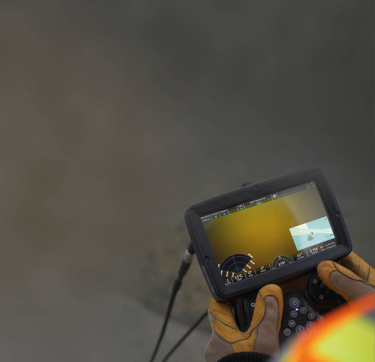 Revolution over the shoulder shot showing imaging sonar and USBL map on screen 