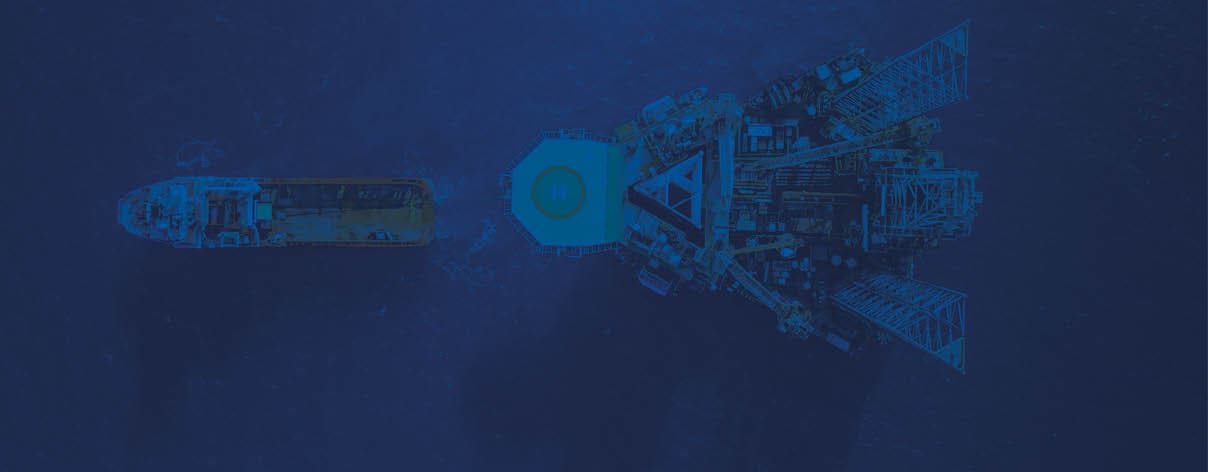 Aerial view of jack up rig with towing vessel during towing operation