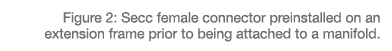 Figure 2: Secc female connector preinstalled on an extension frame prior to being attached to a manifold 