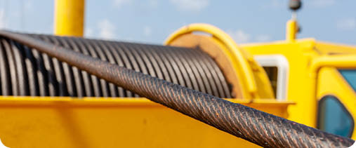 Wire rope sling or cable sling on crane reel drum  or winch roll of crane the lifting machine in heavy industrial