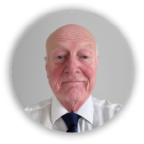 A man with a bald head wearing a white shirt and a blue tie. Description generated by AI