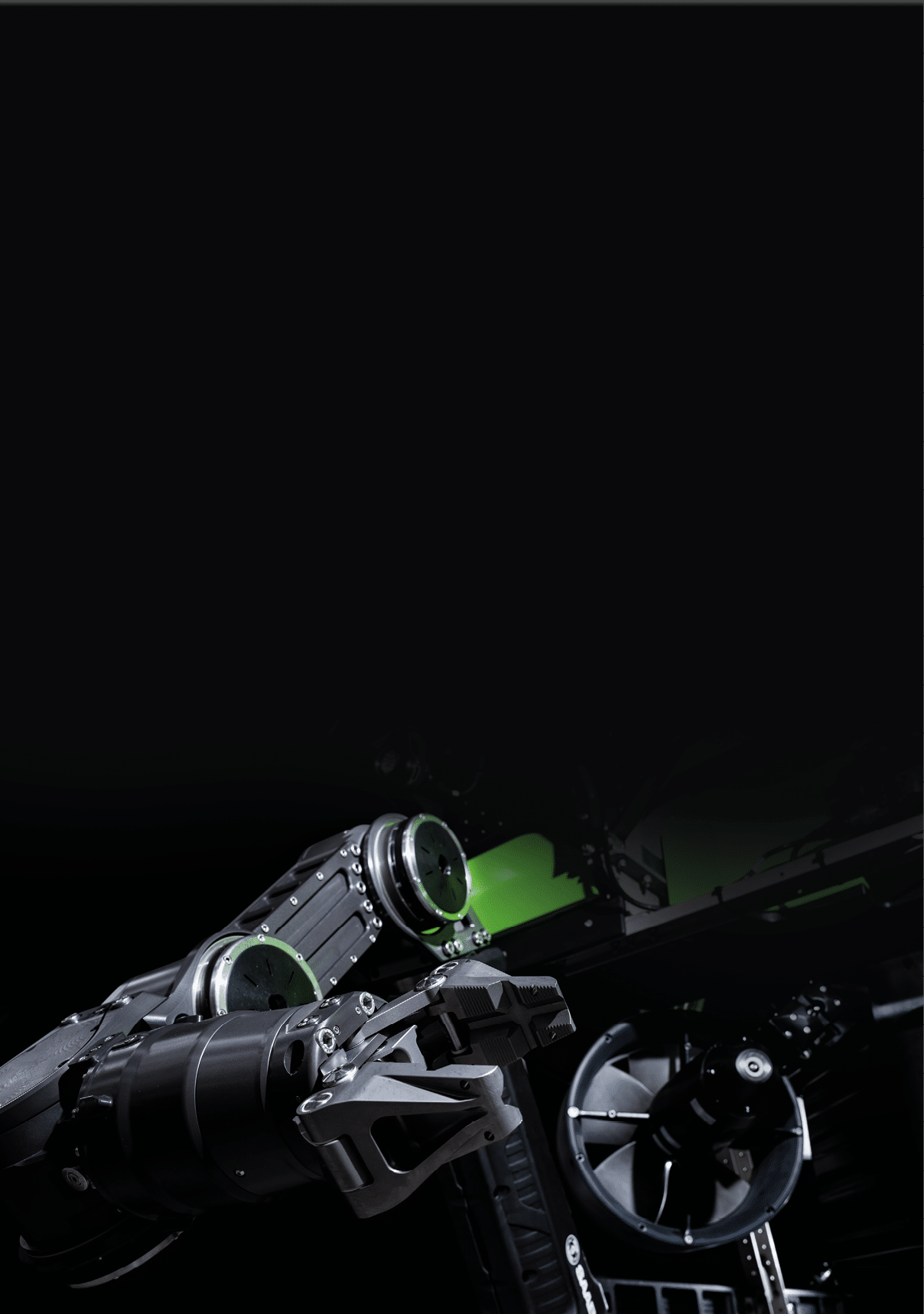 A black and green object with a green light on it. Description generated by AI