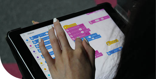 A person is using a tablet computer. Description generated by AI