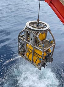 The ISURUS ROV being deployed and recovered 